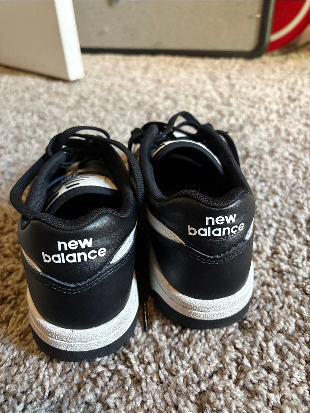 New Balance Men's Black and White Classic Low-Top Sneakers